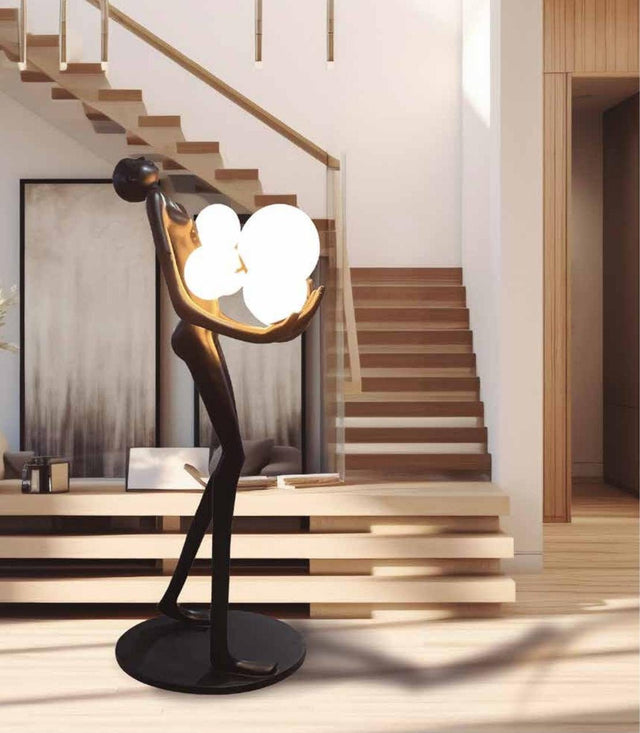 Lámpara escultura de mujer con bolas de luz
