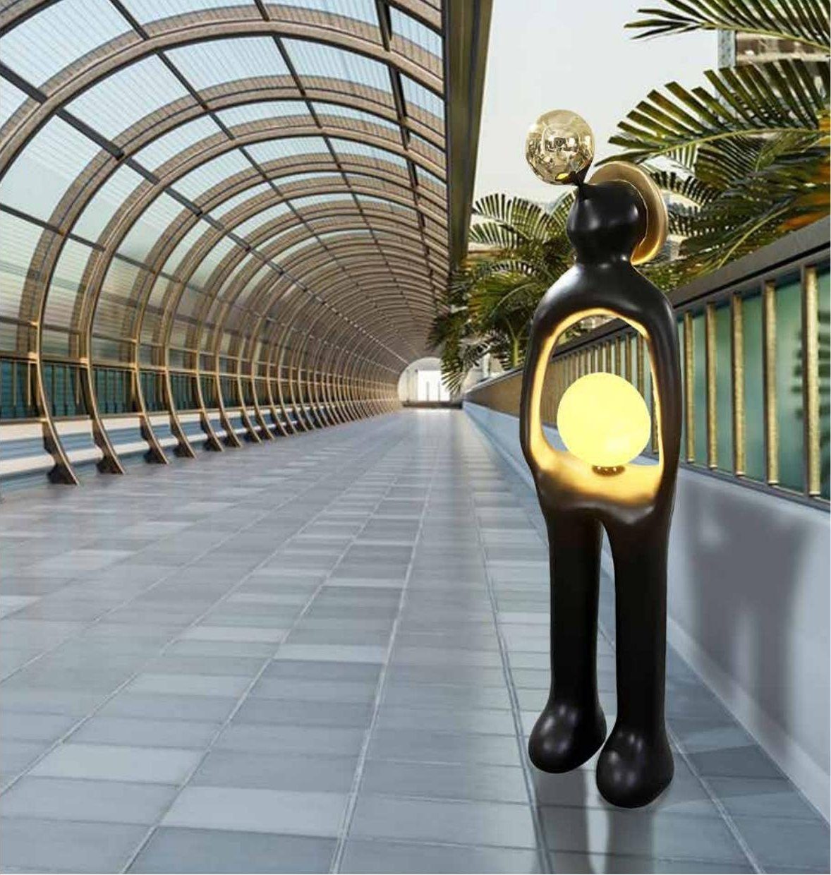 Escultura de figura negra con hueco de luz LED