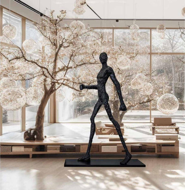 Escultura de hombre caminando negro con luz LED 185 cm