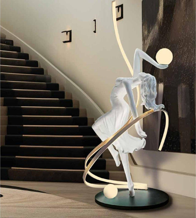 Escultura de bailarina blanca con cinta de luz LED