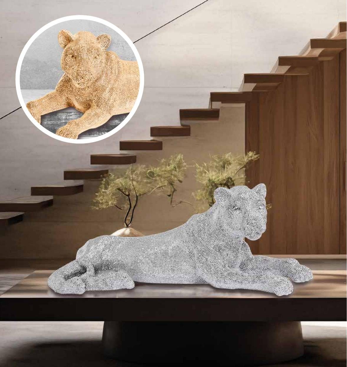 Figura de leona tumbada plata u oro