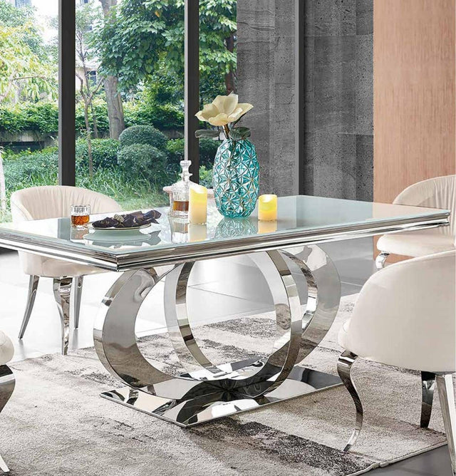 Silla con reposabrazos blanca de polipiel y acero